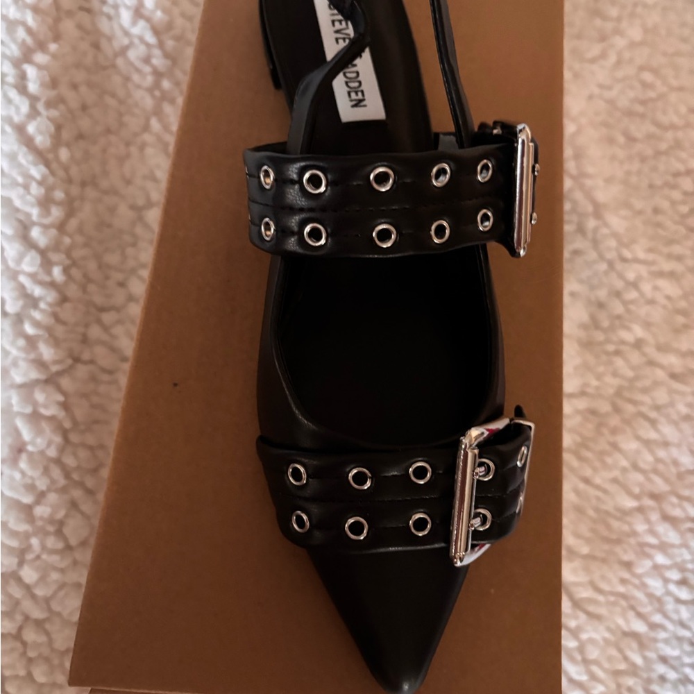 Steve Madden Black Flats with Edgy Detailing